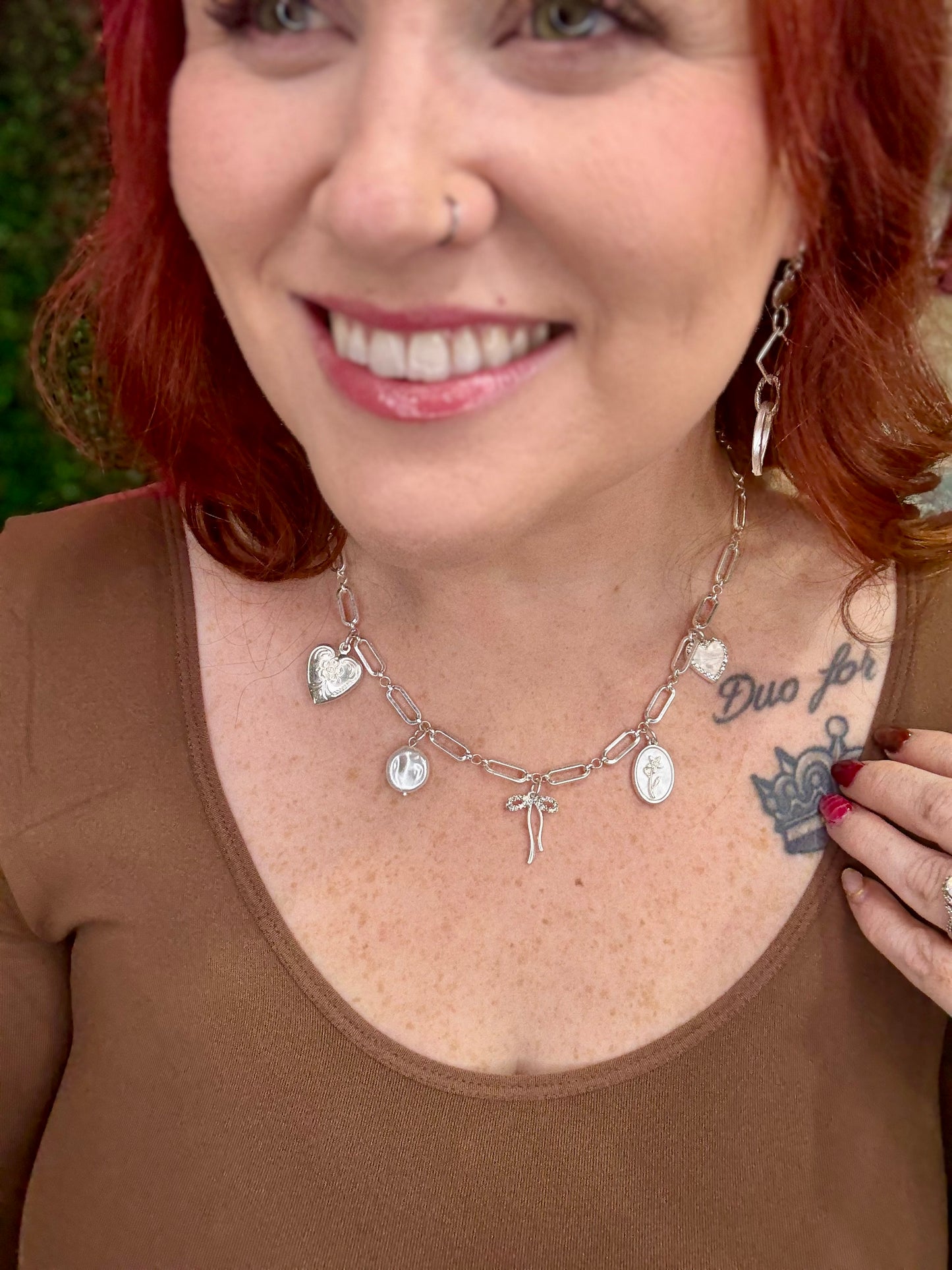 Bow Charm Necklace In Silver