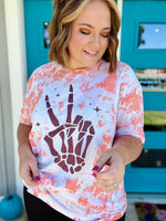 Skellie Peach Hands on Bleached Orange