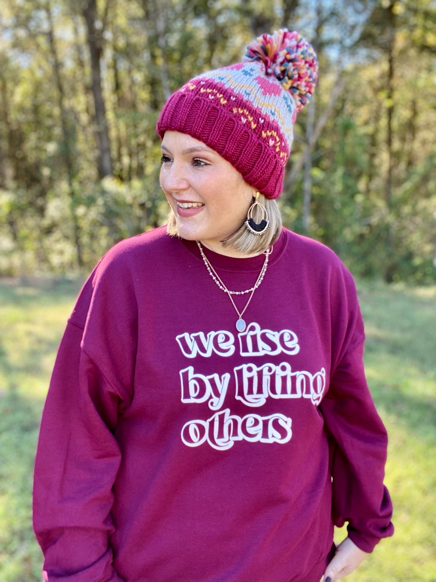 We Rise By Lifting Others Sweatshirt