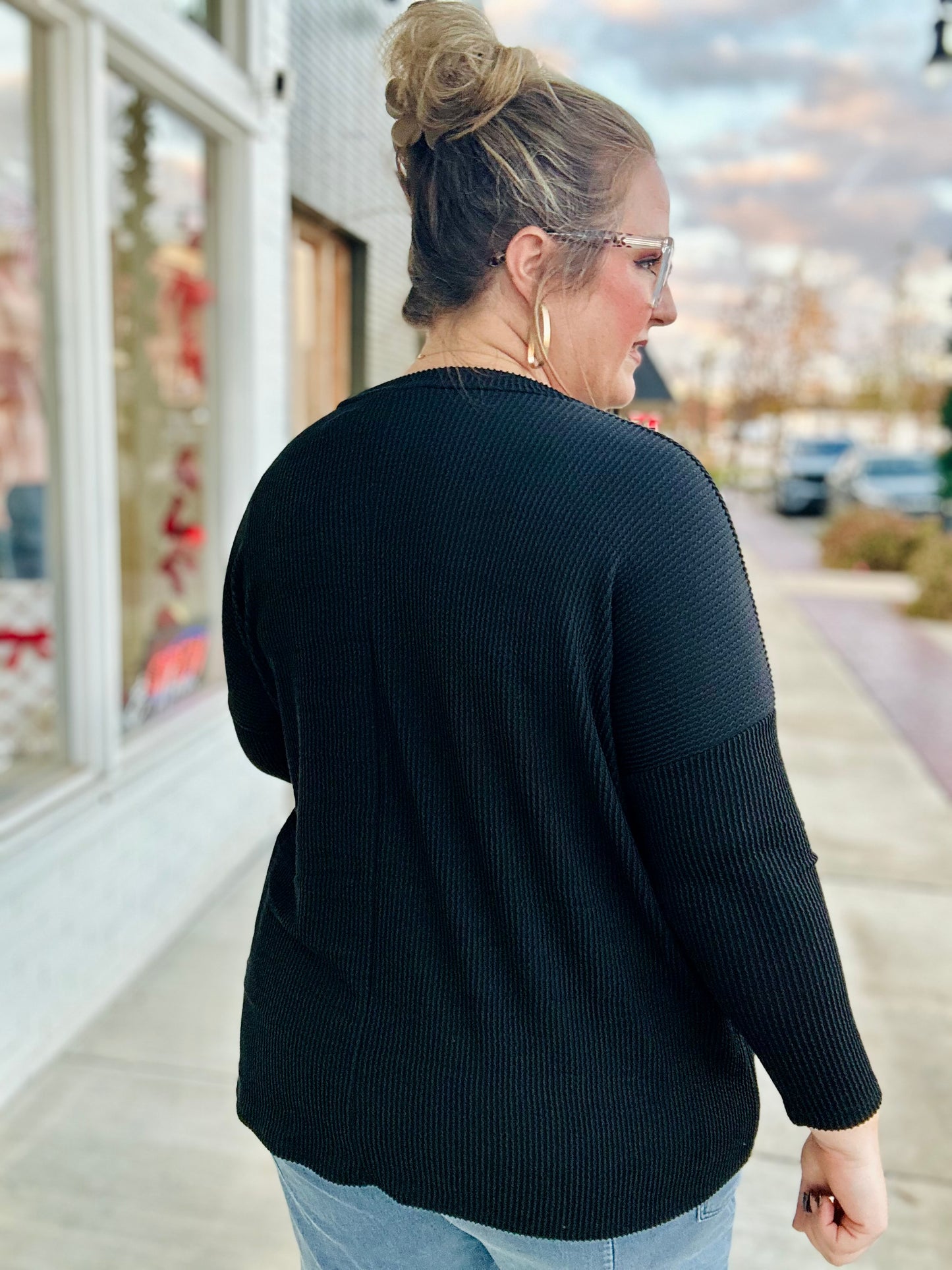 **DOORBUSTER** Karen V Neck Ribbed Top In Black