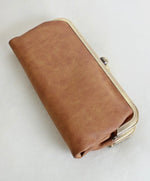 Karen Kiss Lock Clutch in Tan
