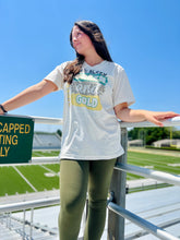 Load image into Gallery viewer, &quot;We Bleed&quot; School Colors V-Neck Tee on Oatmeal (Customizable)